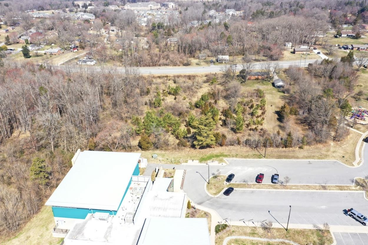5309 Hilltop Road Greensboro, NC 27407 - Photo 8 of 8 a bathroom with a bathtub and a shower