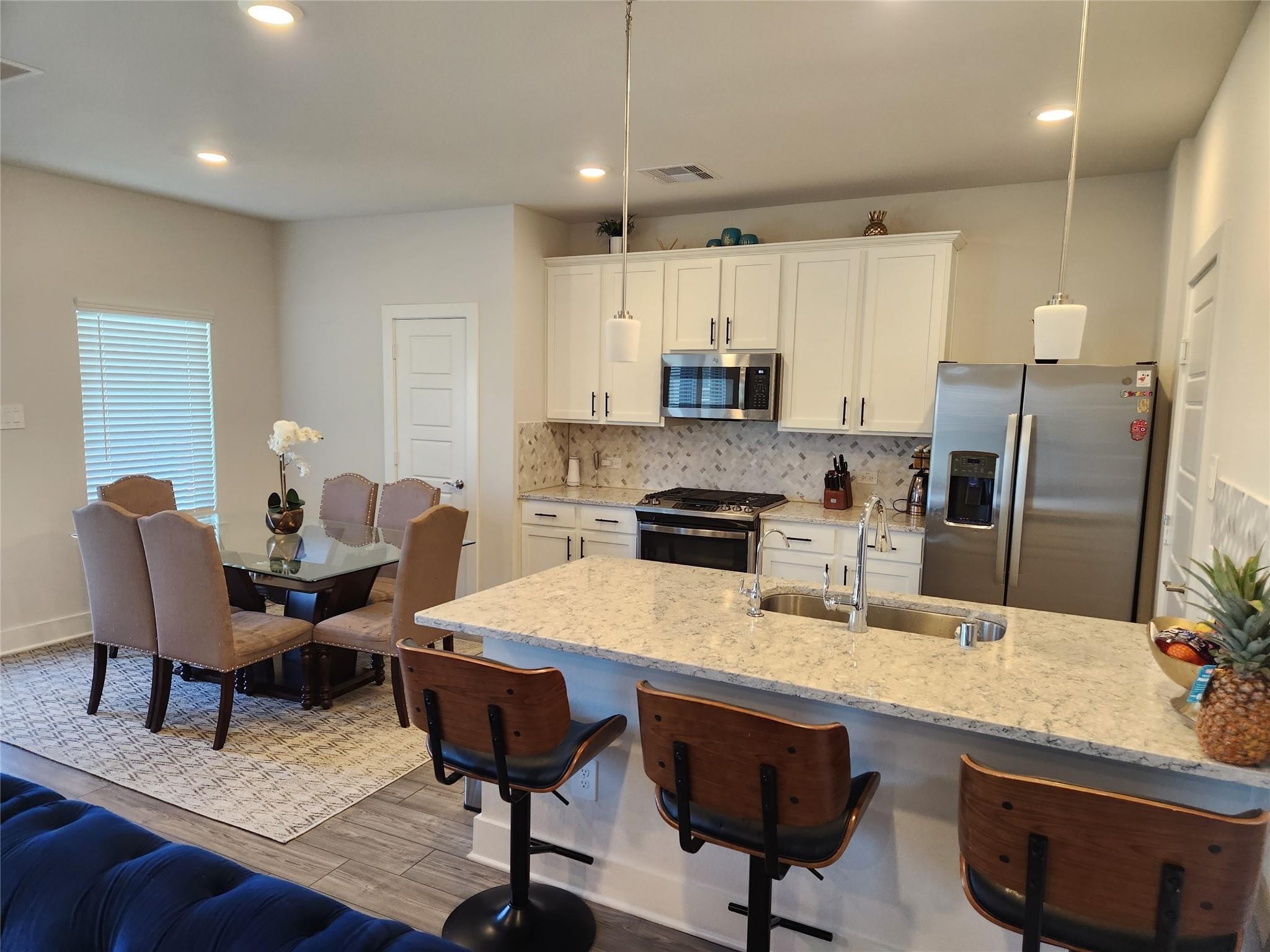 10603 Whitejacket Conroe, TX 77385 - Photo 4 of 16 Kitchen/Dining Combo open to Living Area