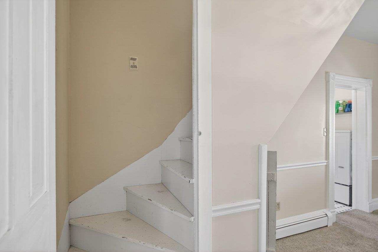 420 West Spring Street Woodstock, VA 22664 - Photo 46 of 67 a view of staircase with white walls and door