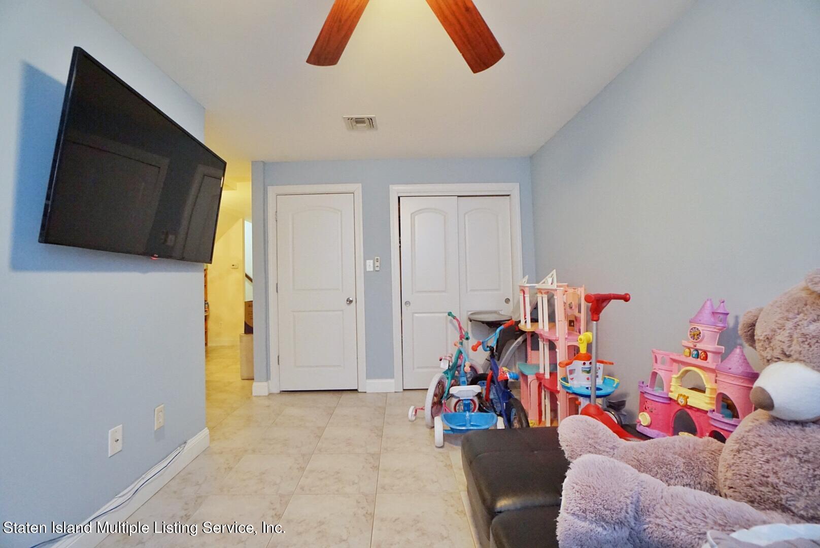 118 Covington Circle Staten Island, NY 10312 - Photo 32 of 41 (32) FULL FINISHED BASEMENT