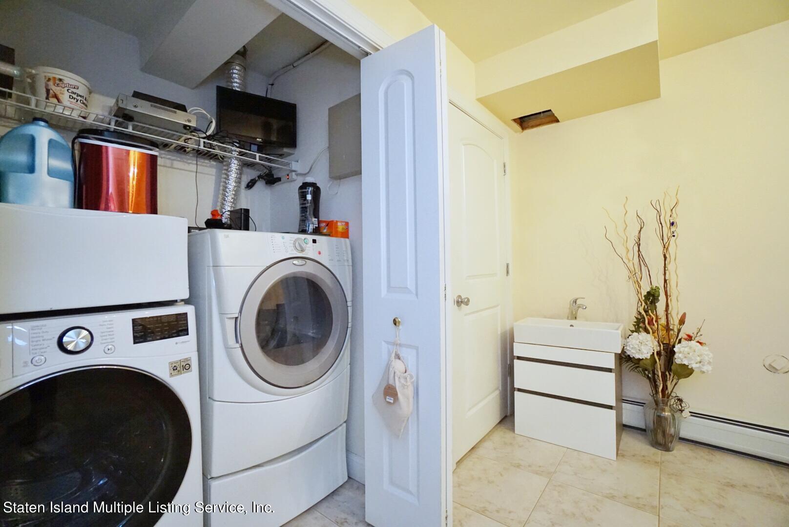 118 Covington Circle Staten Island, NY 10312 - Photo 34 of 41 (34) BASEMENT LAUNDRY ROOM