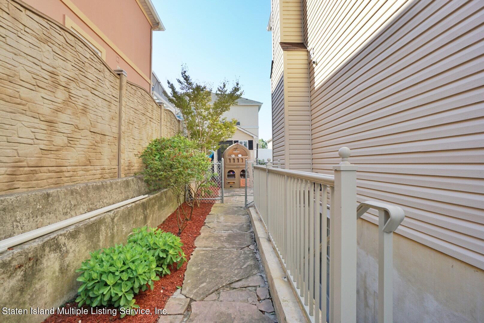118 Covington Circle Staten Island, NY 10312 - Photo 36 of 41 (36) BASEMENT SIDE ENTRY