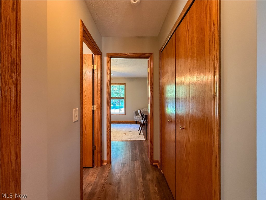 125 Pondview Circle Rittman, OH 44270 - Photo 16 of 38 Hall to bedrooms with storage closets