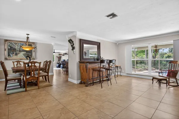 a view of a livingroom with furniture window and outside view