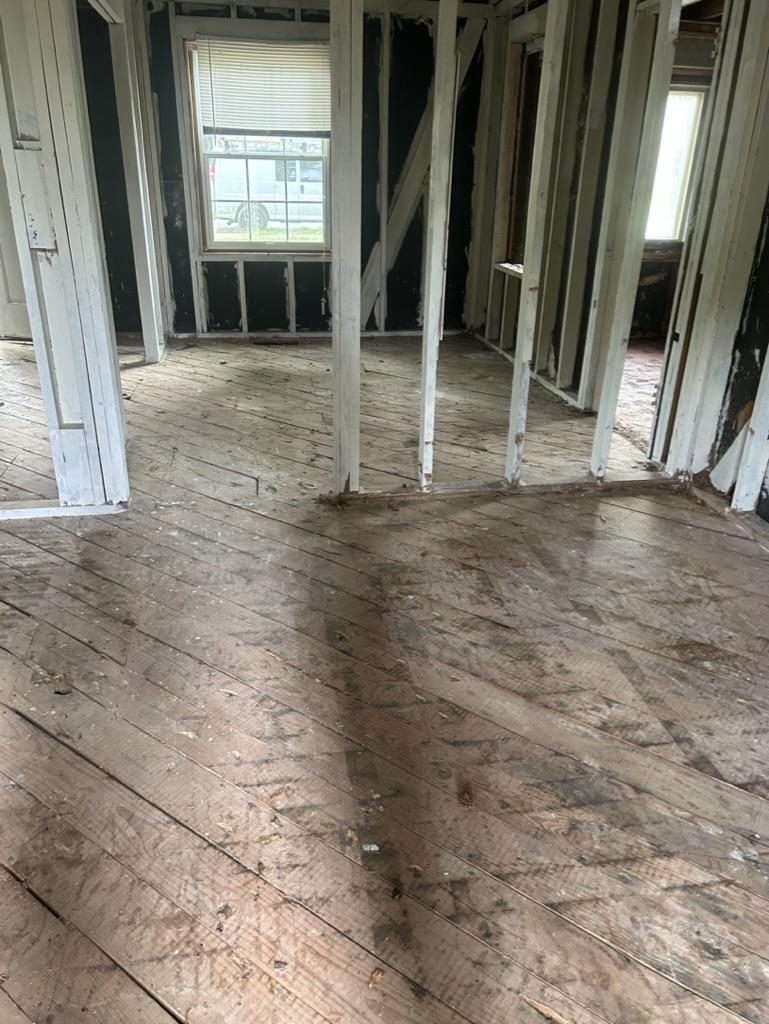 966 Goodman Street Memphis, TN 38111 - Photo 18 of 25 a view of an empty room with a fireplace