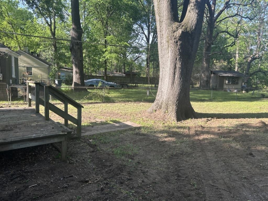 966 Goodman Street Memphis, TN 38111 - Photo 20 of 25 a view of a yard with large tree