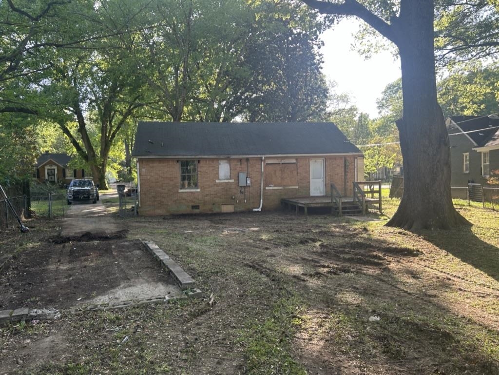 966 Goodman Street Memphis, TN 38111 - Photo 23 of 25 a view of a house with a yard