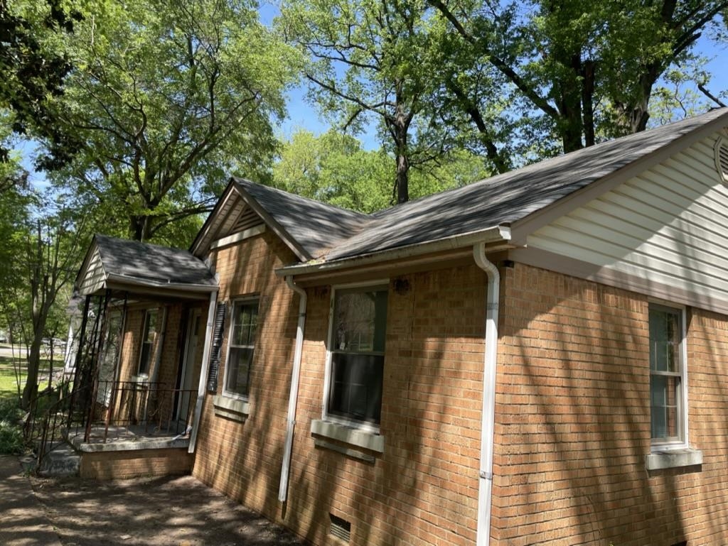 966 Goodman Street Memphis, TN 38111 - Photo 3 of 25 a view of a house with a large tree