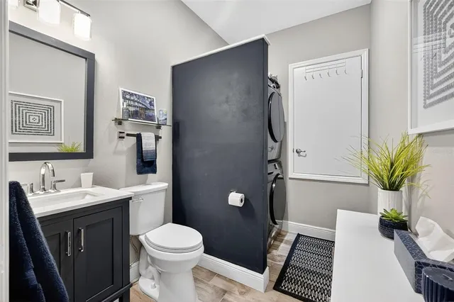 a view of a dining room with furniture wooden floor and chandelier