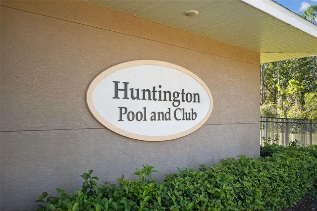 a view of a bench in a backyard