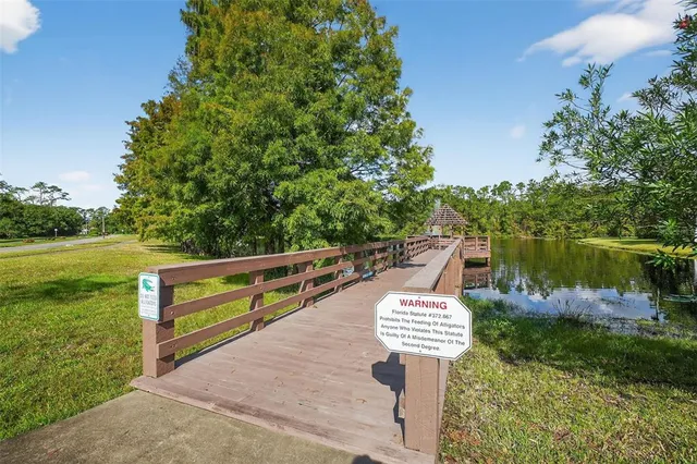 a view of a lake with a house