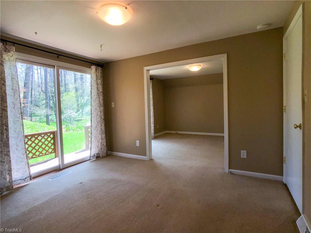 8390 Whipporwill Lane Rural Hall, NC 27045 - Photo 8 of 40 Large dressing/sitting room! Door on right to full updated bath!