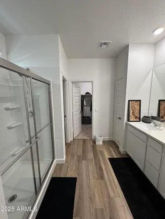 a view of a bathroom from the hallway