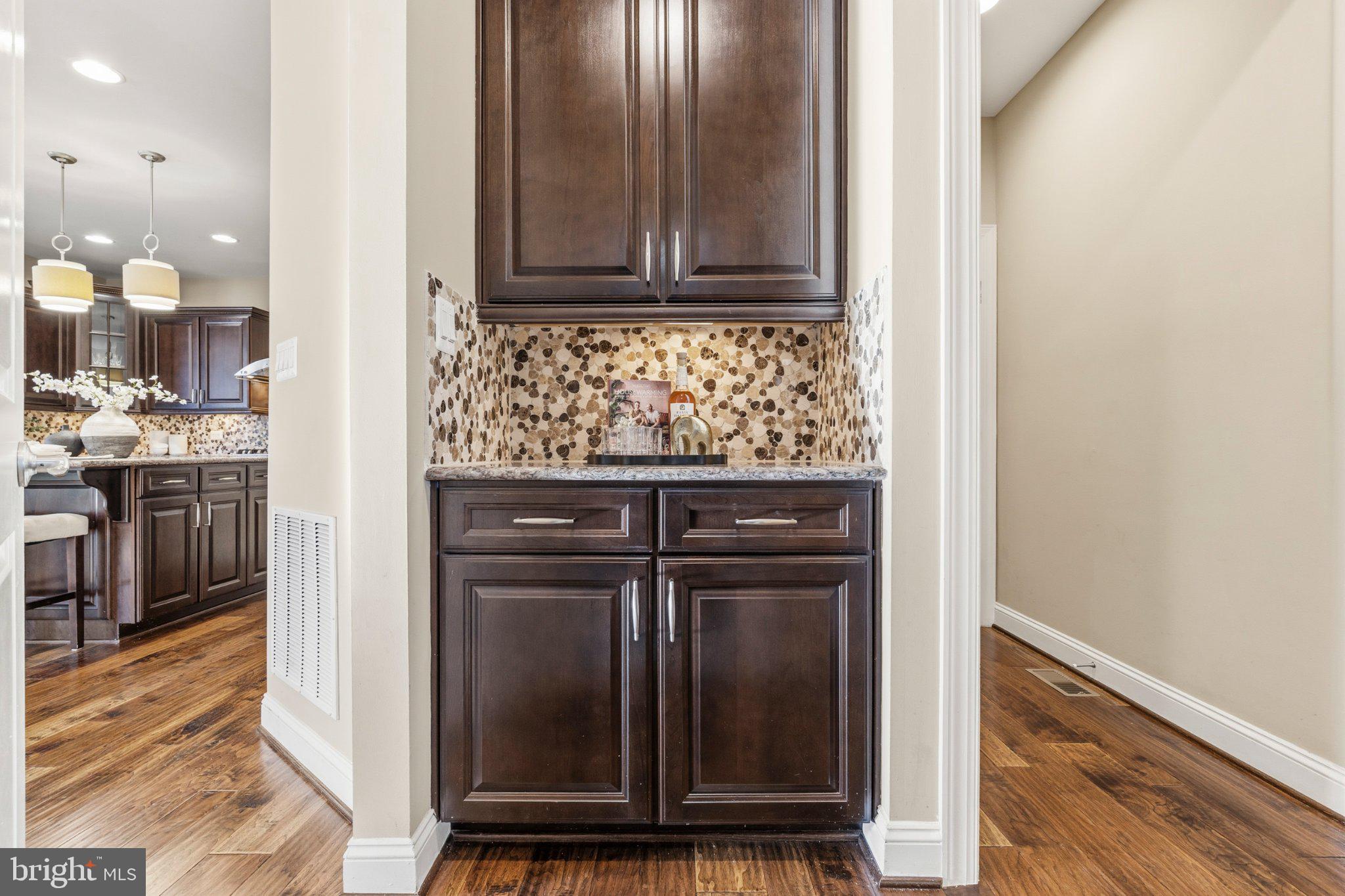 731 Holden Road Frederick, MD 21701 - Photo 13 of 78 Elegant hallway with rich cabinetry.