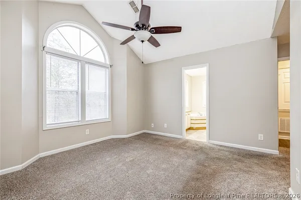 an empty room that has a window