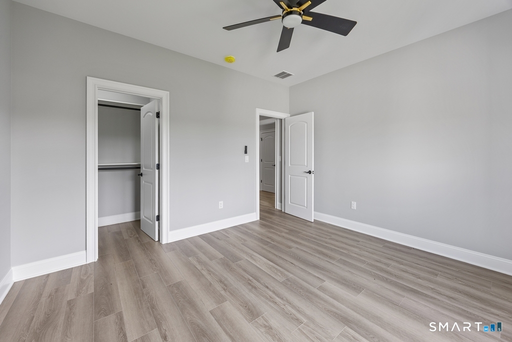 210 Munson Road, Unit 1B Wolcott, CT 06716 - Photo 12 of 28 Primary bedroom