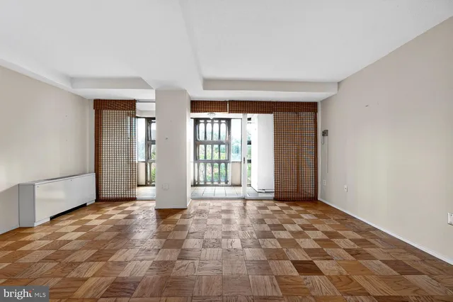 a kitchen with stainless steel appliances granite countertop a refrigerator a sink and a stove