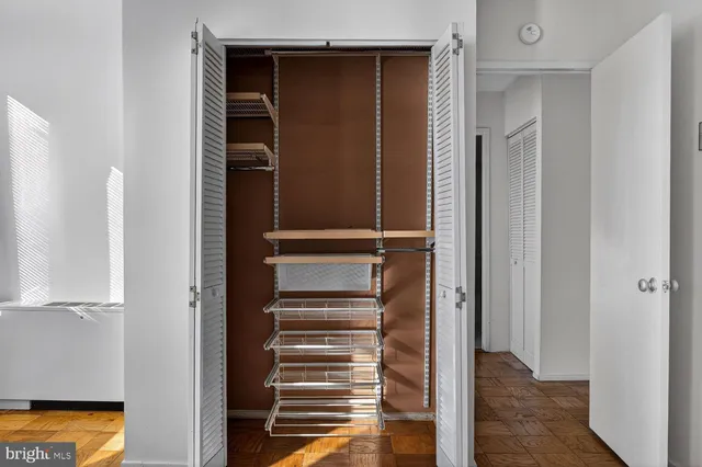 a view of a room with a large window