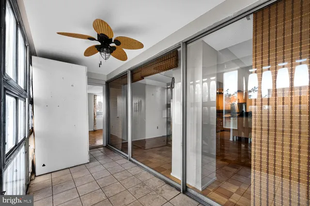 a view of gallery with wooden floor