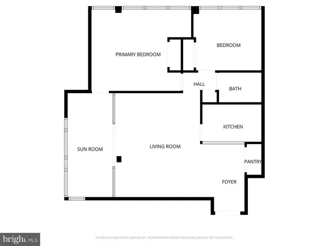 a view of a livingroom with furniture and a window