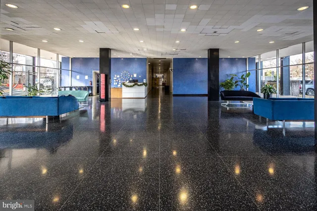 a room with gym equipment and a large window