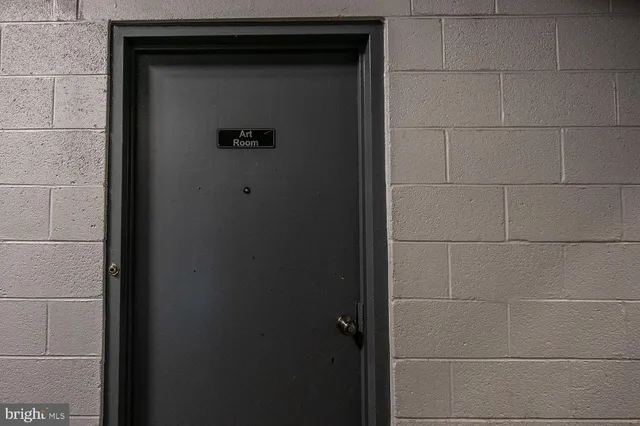 a view of a park with large trees