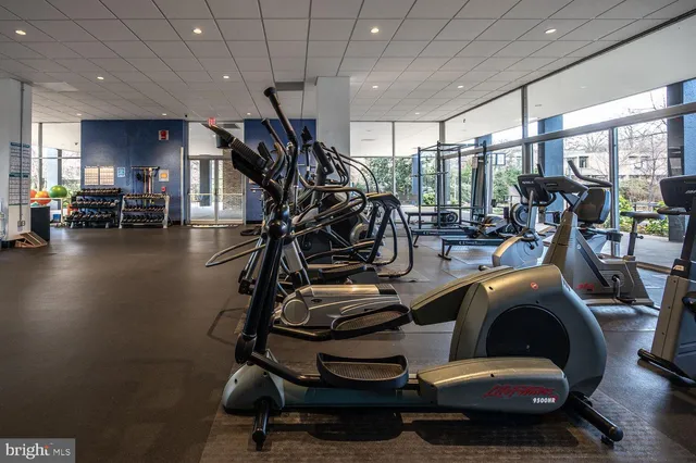 a view of a street sign on a sidewalk