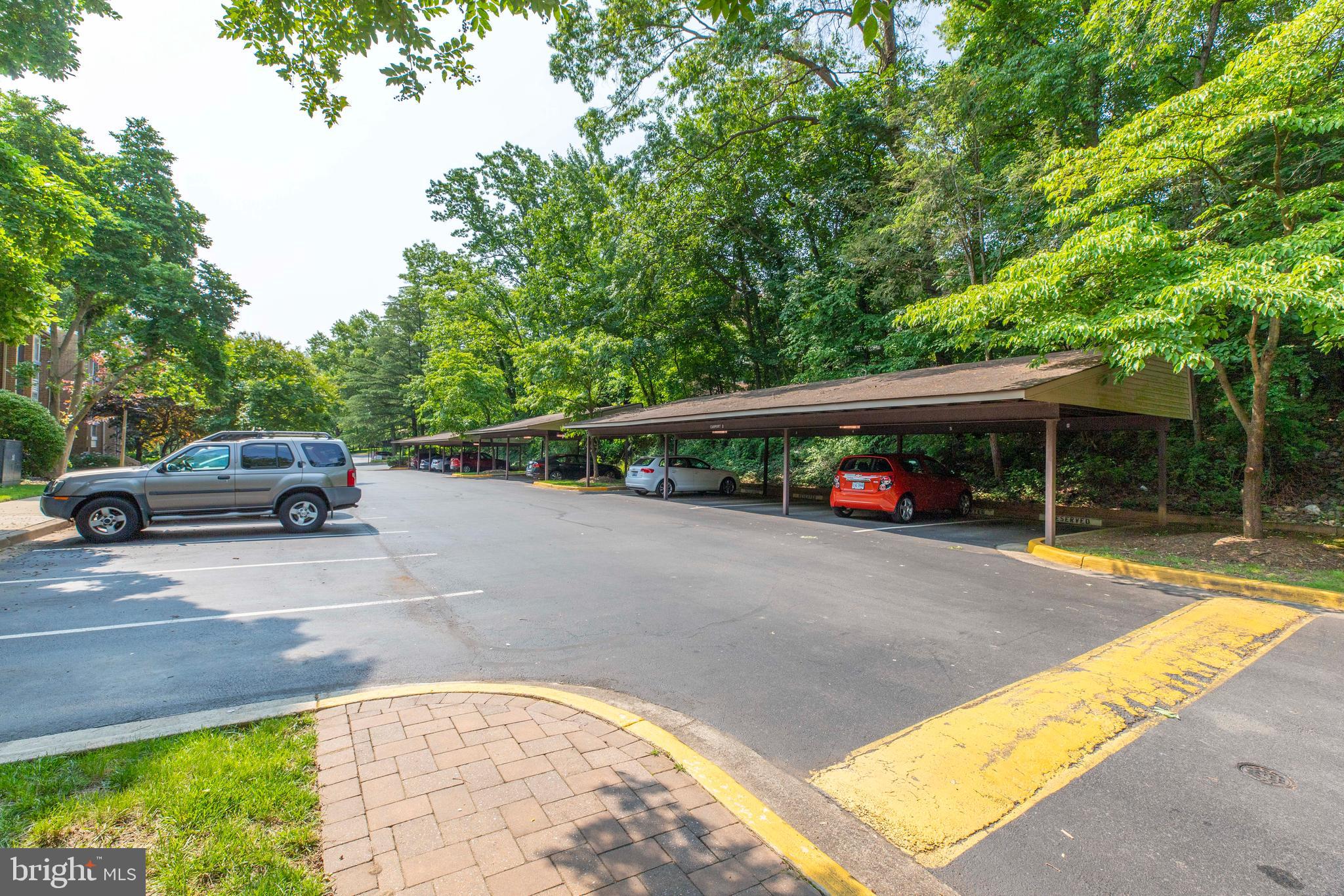 2106 Green Watch Way, Unit 101 Reston, VA 20191 - Photo 2 of 40 a view of street with parked cars