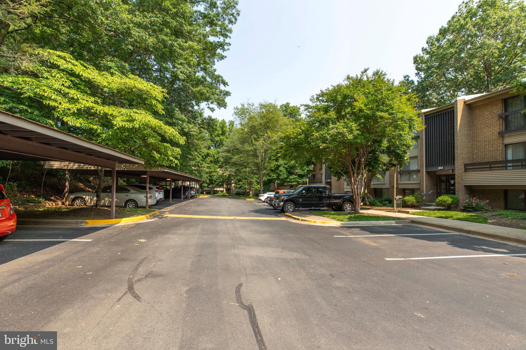 2106 Green Watch Way, Unit 101 Reston, VA 20191 - Photo 39 of 40 a view of street with parked cars