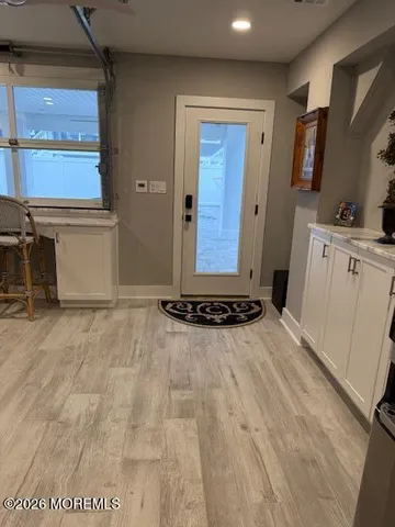 a view of livingroom with furniture and a flat screen tv