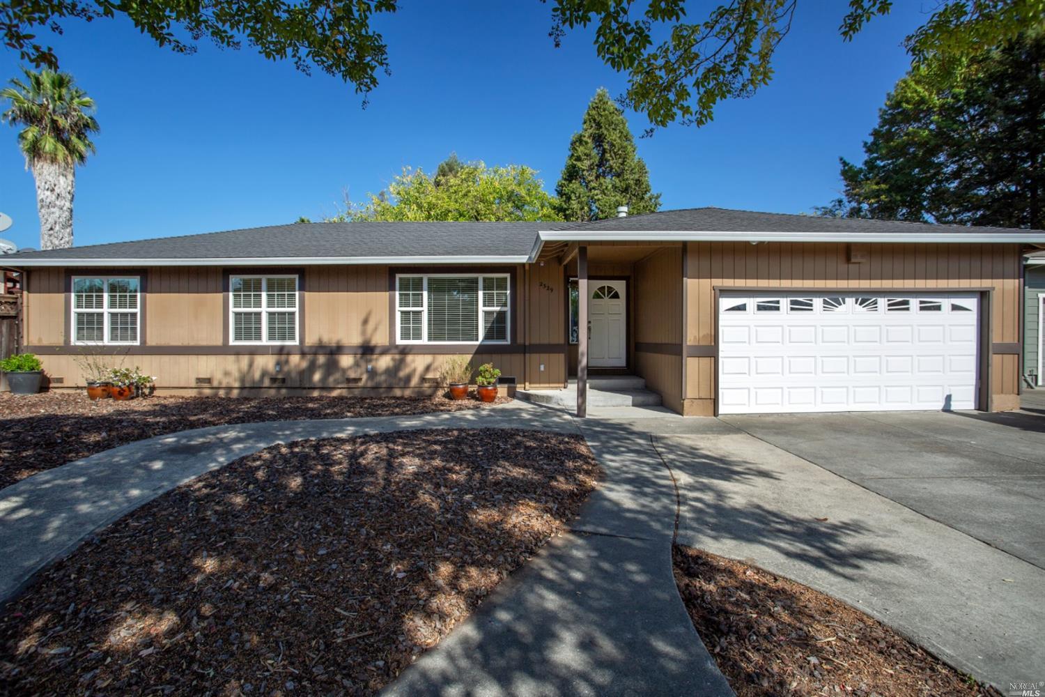 2329 Sundance Street Santa Rosa, CA 95403 - Photo 1 of 1 a front view of a house with a yard