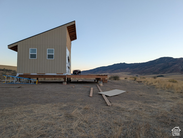 13900 Dirty Head Road Clarkston, UT 84305 - Photo 11 of 25 View of side of home featuring a mountain view