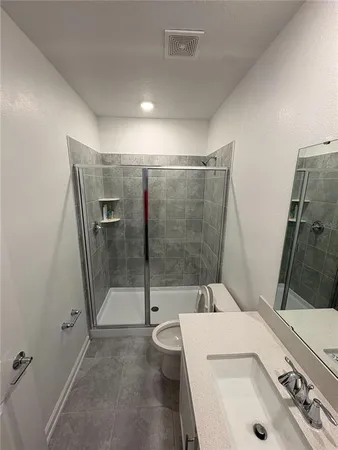 a bathroom with a sink and a shower