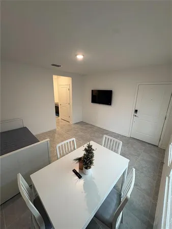 a view of a dining room with furniture