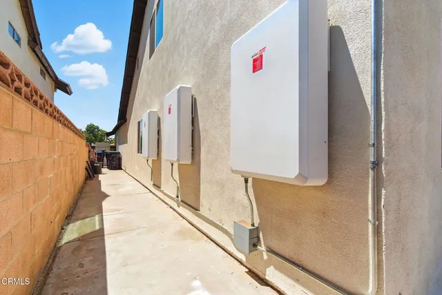 a view of a hallway with windows