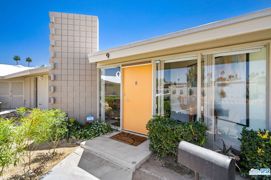 37800 Da Vall Drive, Unit 9 Rancho Mirage, CA 92270 - Photo 1 of 24 a view of building with potted plants