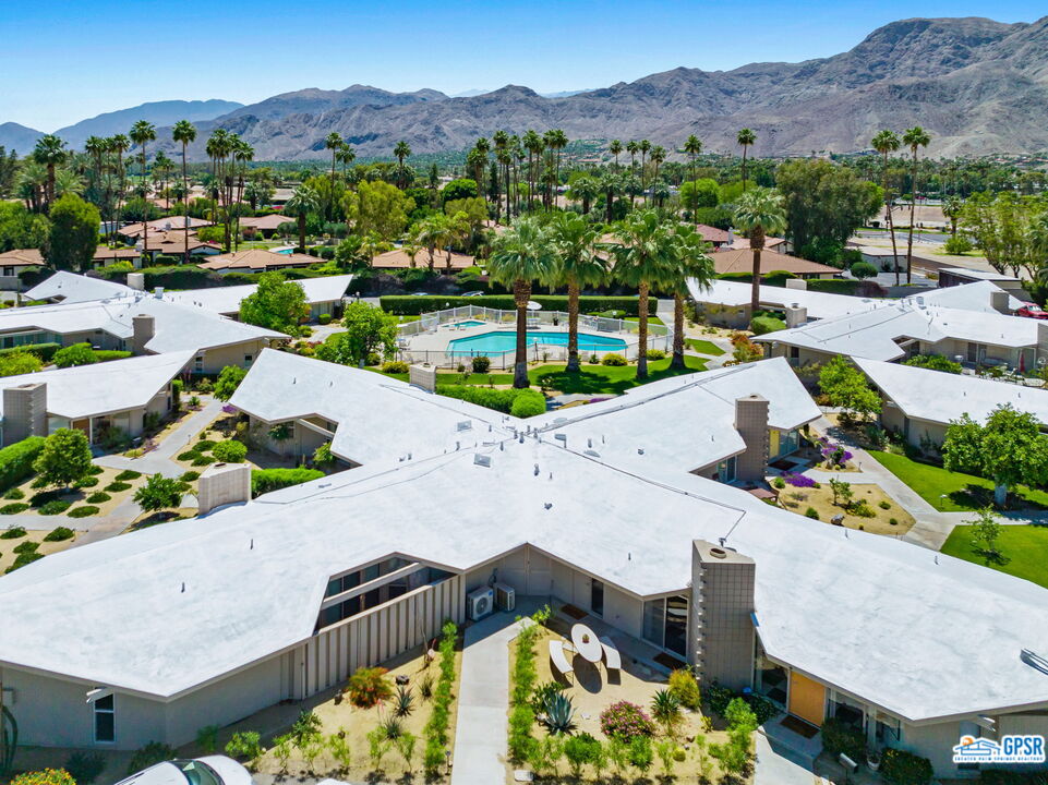 37800 Da Vall Drive, Unit 9 Rancho Mirage, CA 92270 - Photo 3 of 24 an aerial view of a house with a garden
