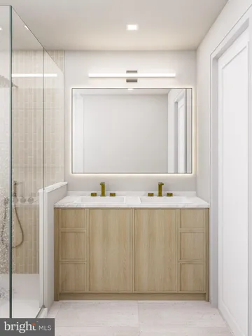 a bathroom with a bathtub and a sink