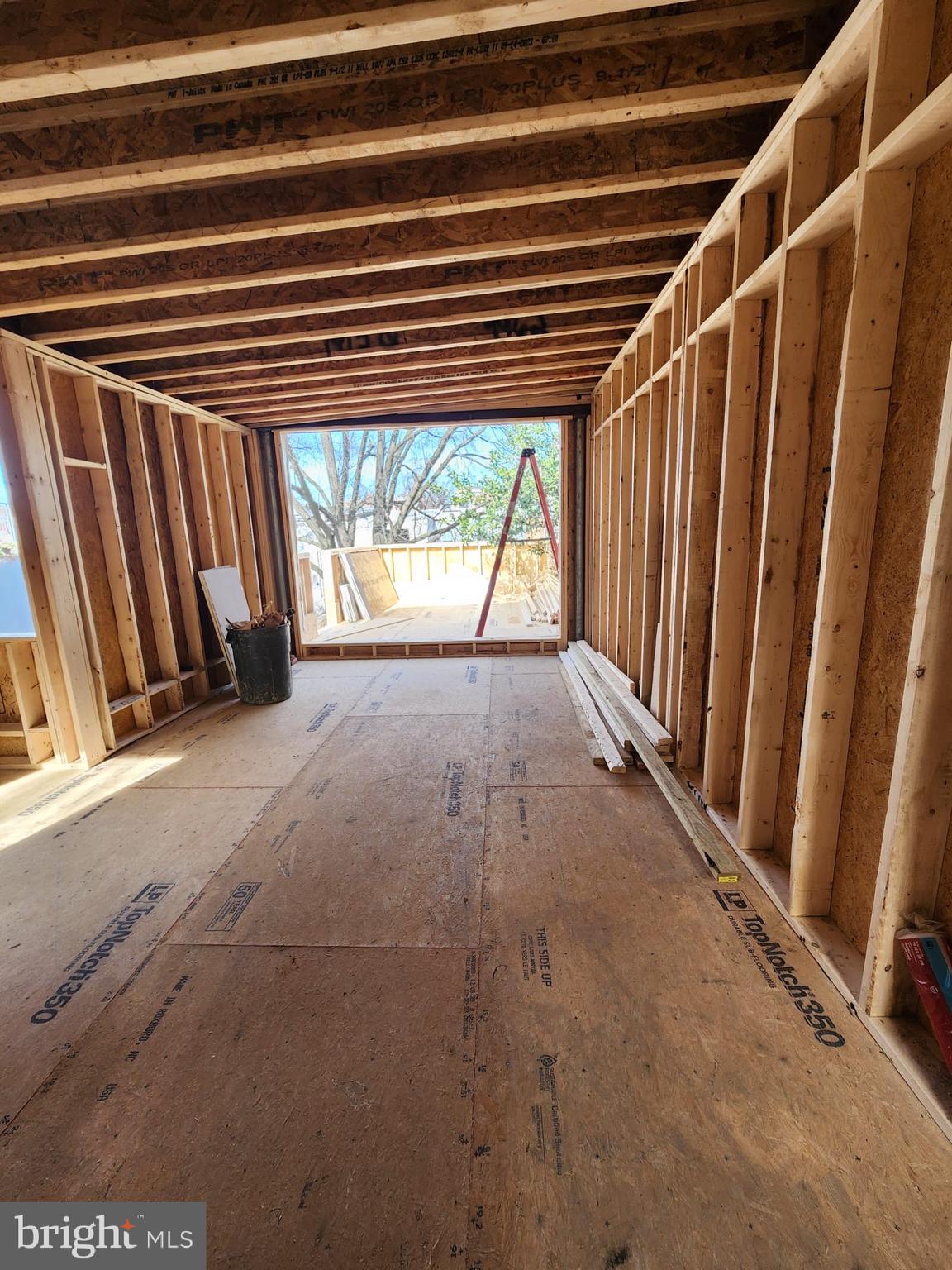 1415 Q Street Northwest, Unit 1 Washington, DC 20009 - Photo 4 of 5 a view of an empty room with a fireplace and a window