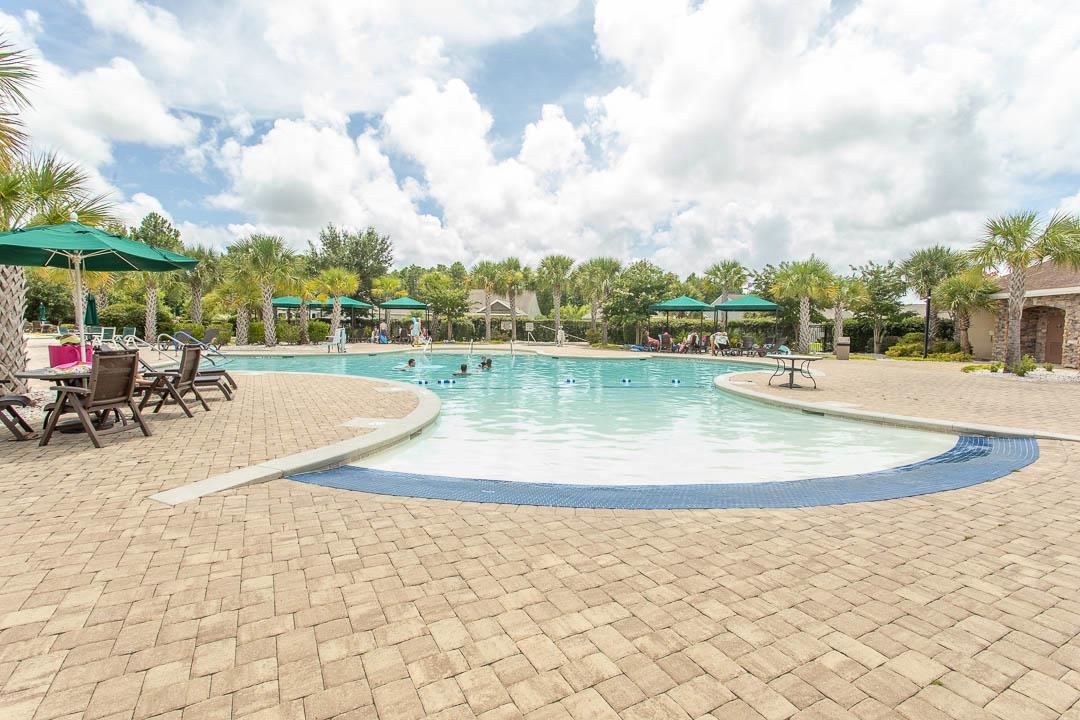 4348 Livorn Loop, Unit 41 Myrtle Beach, SC 29579 - Photo 26 of 30 Community pool with a patio