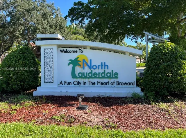 a sign on the side of the road