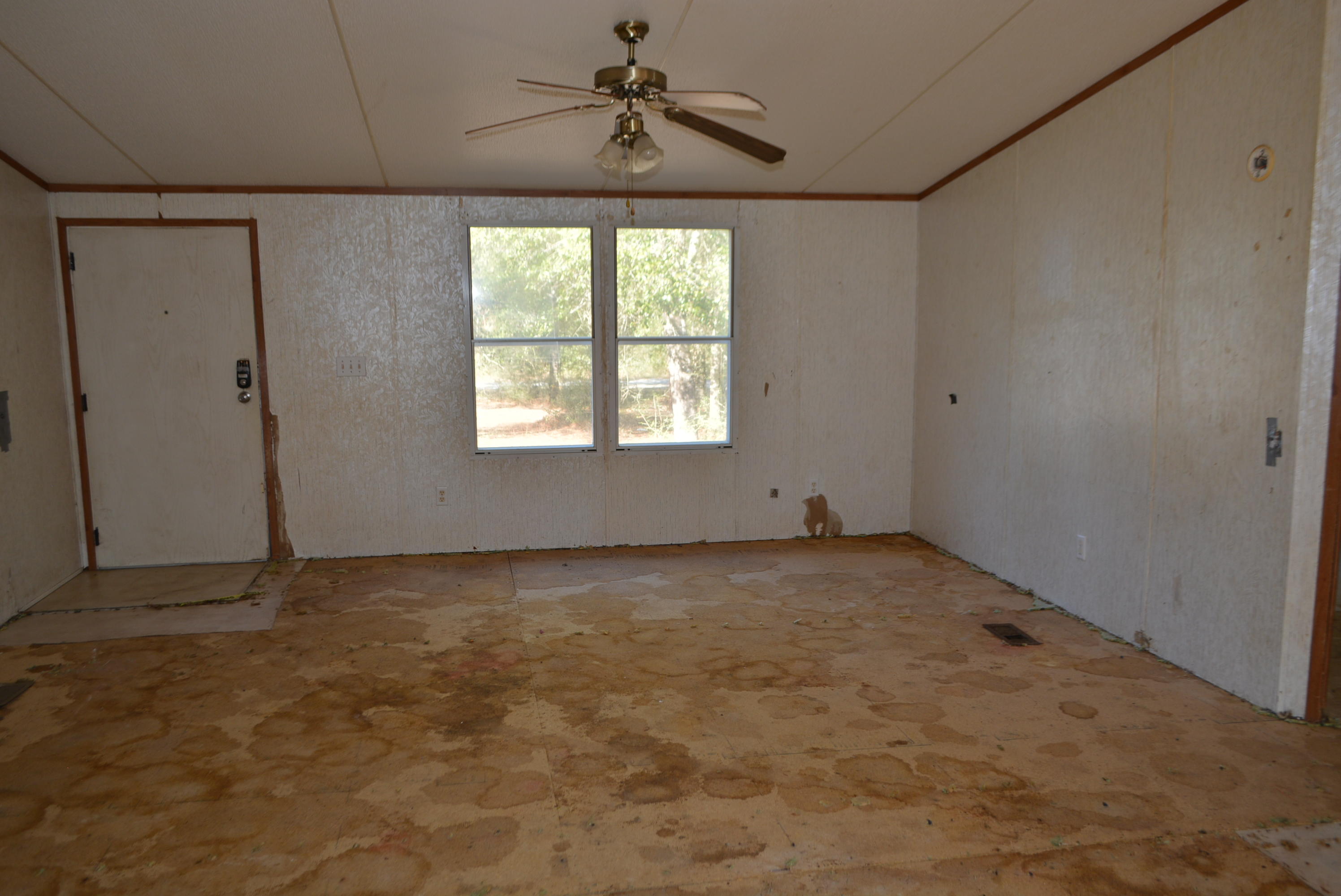197 Ranger Road DeFuniak Springs, FL 32433 - Photo 13 of 16 a view of an empty room with a window