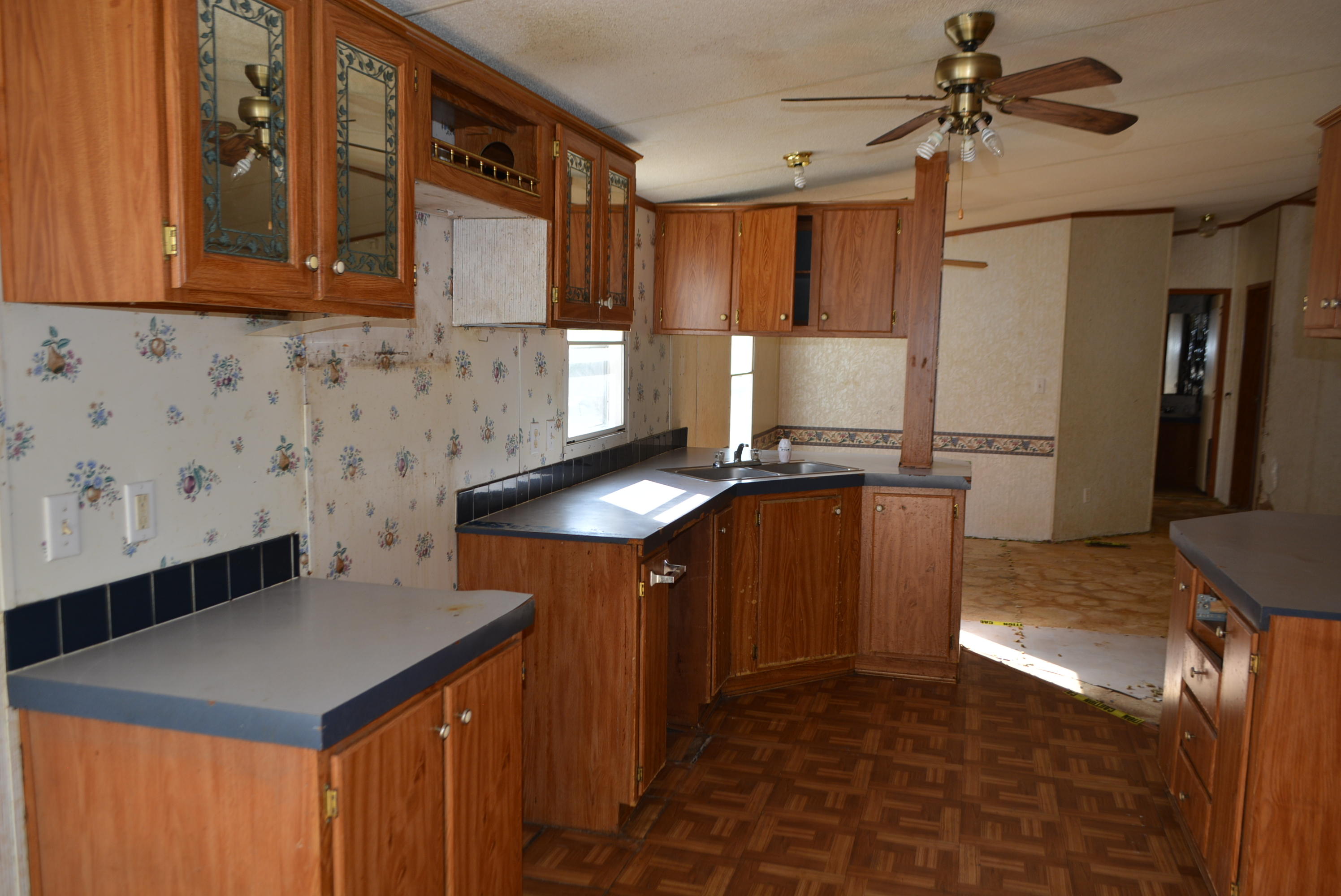 197 Ranger Road DeFuniak Springs, FL 32433 - Photo 2 of 16 a kitchen with a sink a stove and cabinets
