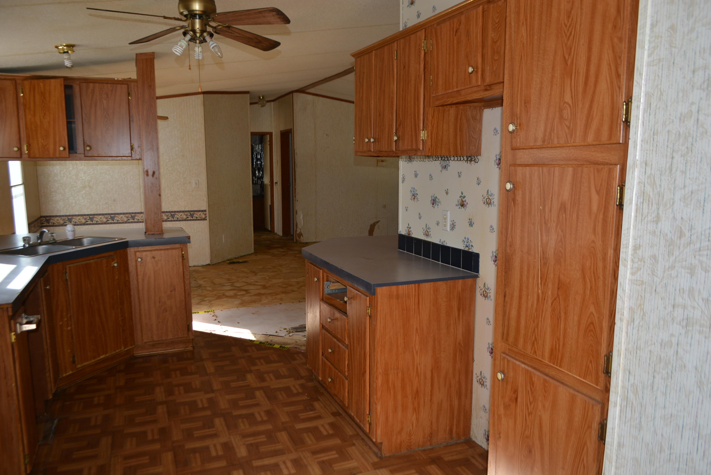 197 Ranger Road DeFuniak Springs, FL 32433 - Photo 3 of 16 a kitchen with granite countertop a refrigerator and a stove