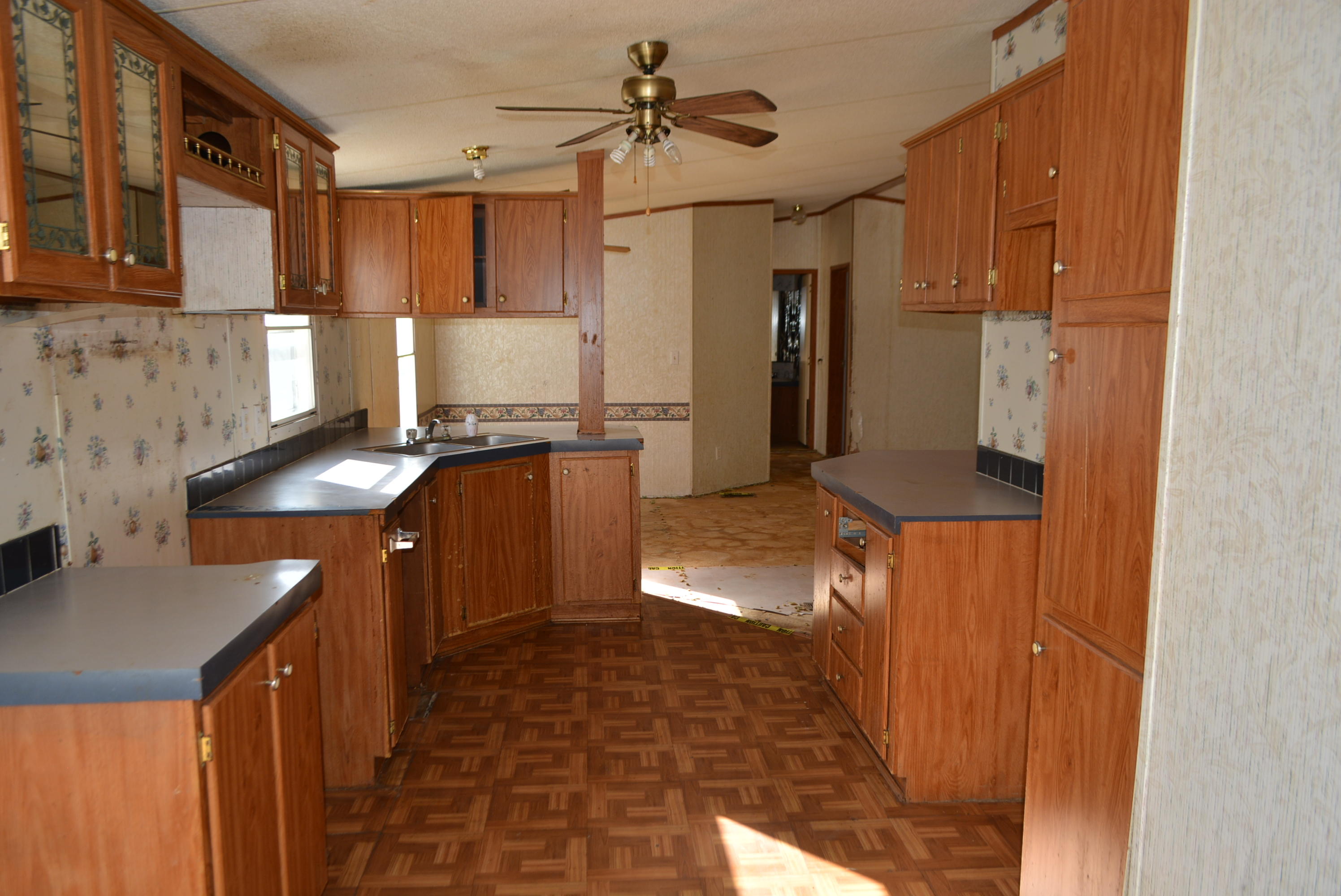 197 Ranger Road DeFuniak Springs, FL 32433 - Photo 4 of 16 a kitchen with stainless steel appliances granite countertop a sink and stove