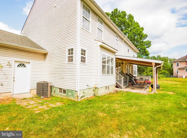 a front view of a house with patio