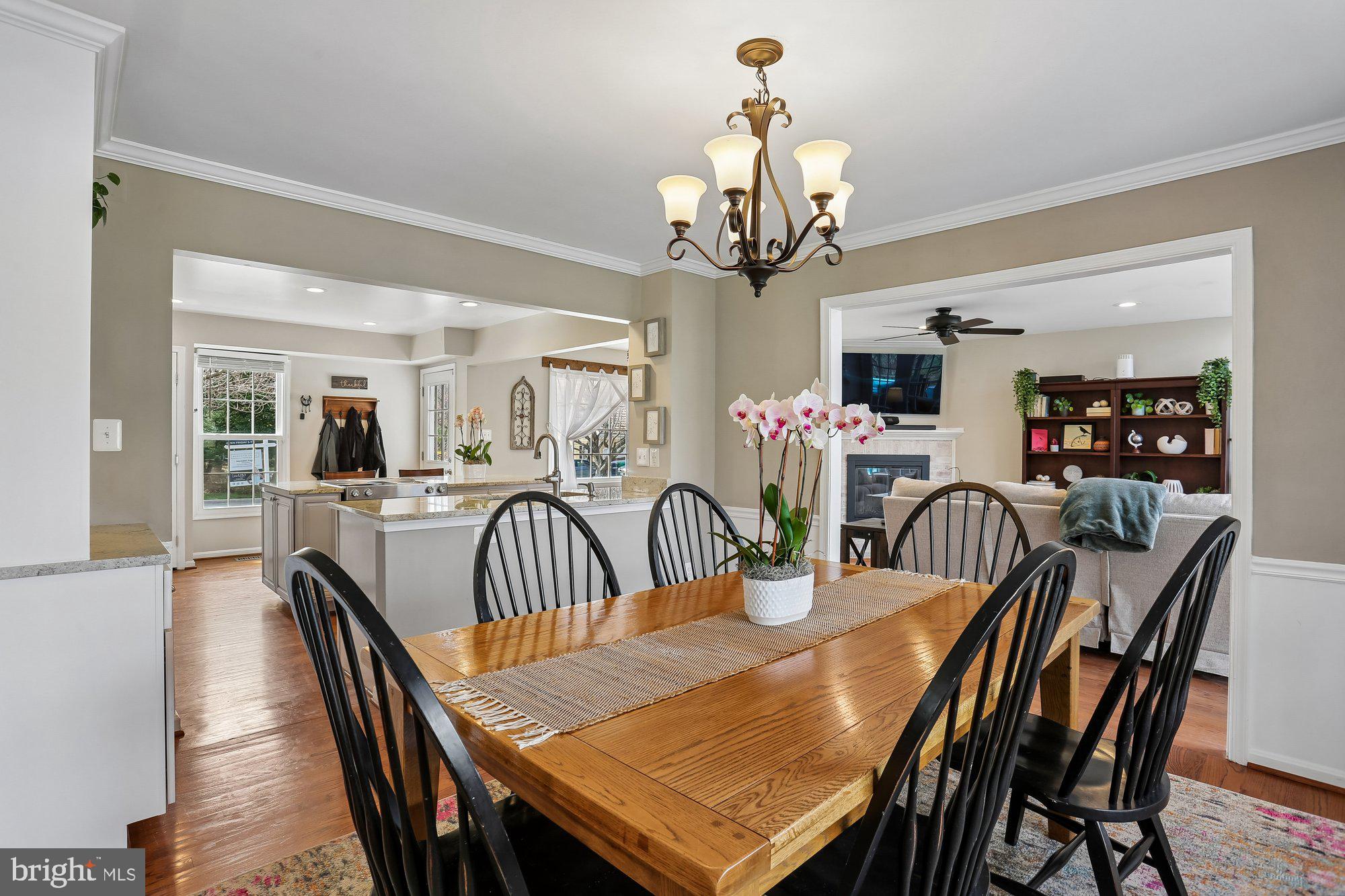 9 Midsummer Court Gaithersburg, MD 20878 - Photo 13 of 69 a view of a dining room with furniture wooden floor and chandelier