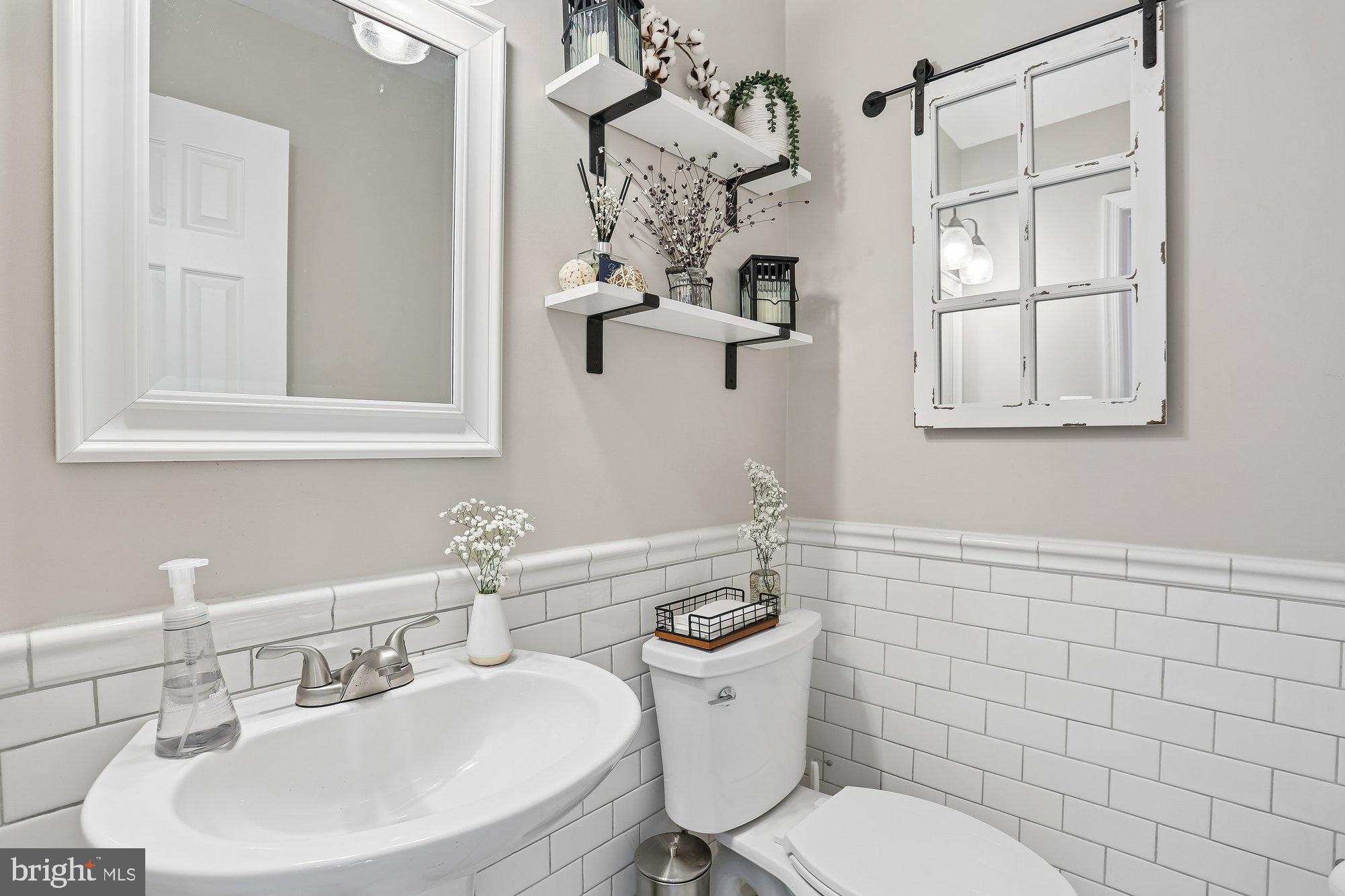 9 Midsummer Court Gaithersburg, MD 20878 - Photo 30 of 69 Powder room with tile finishes