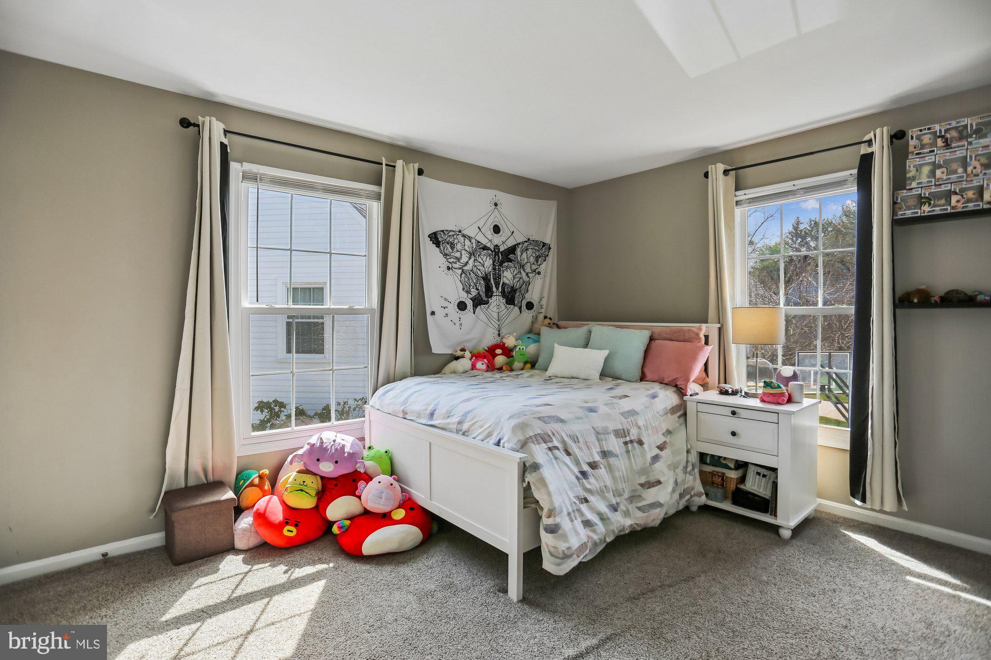 9 Midsummer Court Gaithersburg, MD 20878 - Photo 40 of 69 a bedroom with a bed and a window