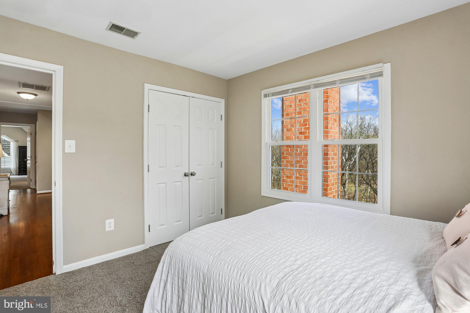 9 Midsummer Court Gaithersburg, MD 20878 - Photo 44 of 69 a bedroom with a bed and a large window